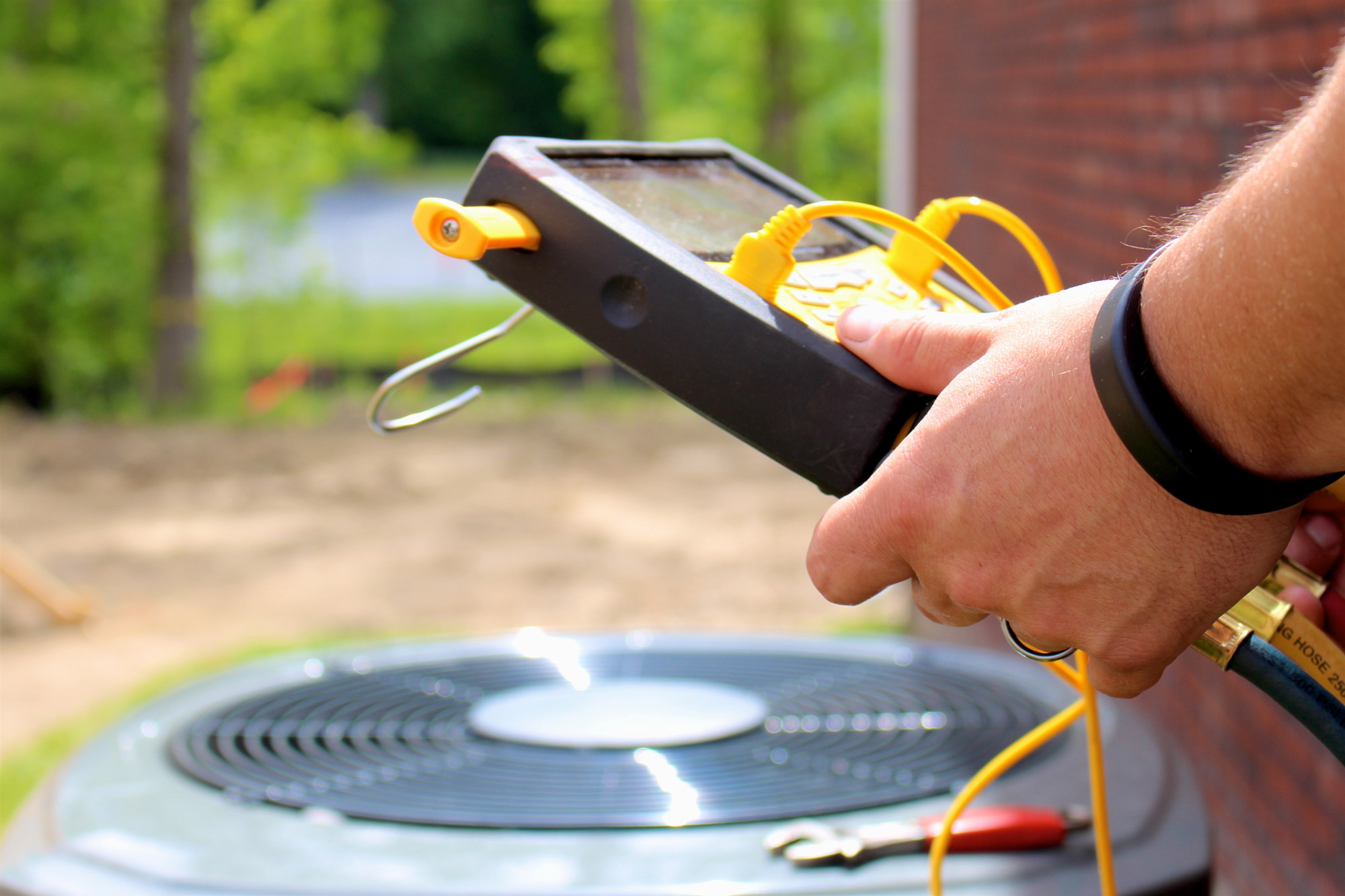 A technician providing AC repair in the Crossville, TN area.